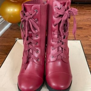Red BCBG boots; size 7.5